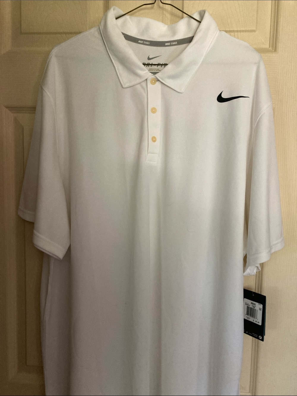 Nike Men’s White Polo with Black Swoosh, size XXL, new with tags